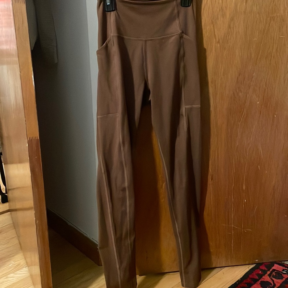 Girlfriend Collective brown compressive leggings with pockets